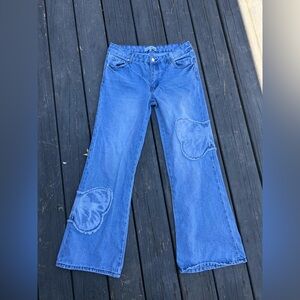 Fashion Nova Blue Flare Jeans with Butterfly Accents